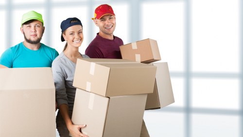 Packing and preparing items for a man with a van booking in Tobelgium
